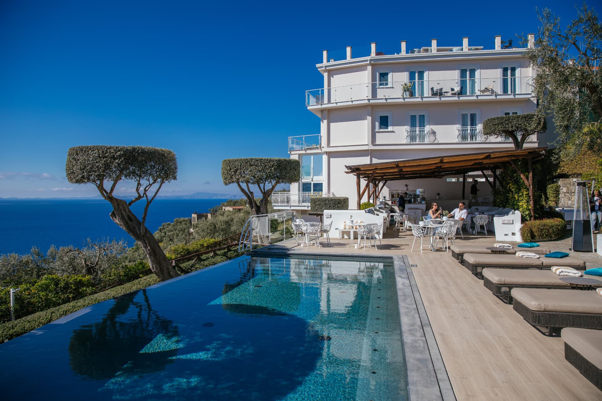 Villa Fiorella Art Hotel's infinity pool and terrace above the Gulf of Naples